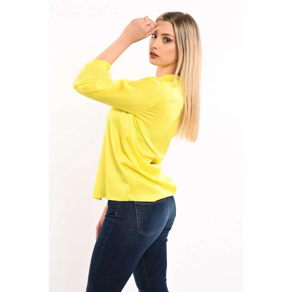 Blusa manica piume Dixie